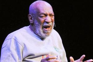 Bill Cosby performing onstage